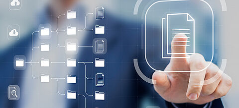 Ein Finger drückt auf ein Display